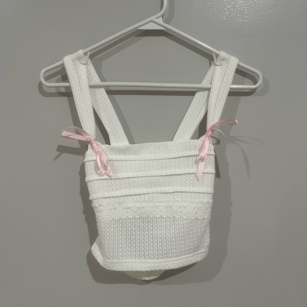 white top with bows